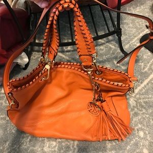 Orange leather authentic Michael Kor’s purse